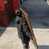 巩义市易鸣搬家公司工人搬运办公家具现场